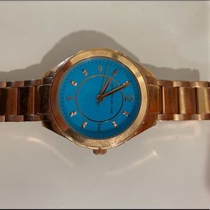 Gold Women’s Watch with Bright blue aqua face